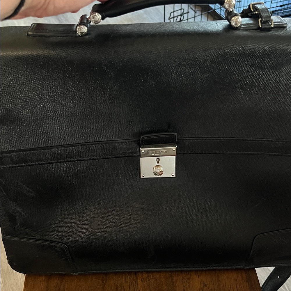 Tumi Black Leather Briefcase with Silver Details